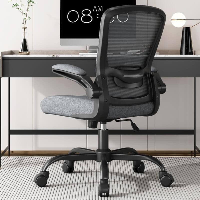 Compact desks and ergonomic chairs